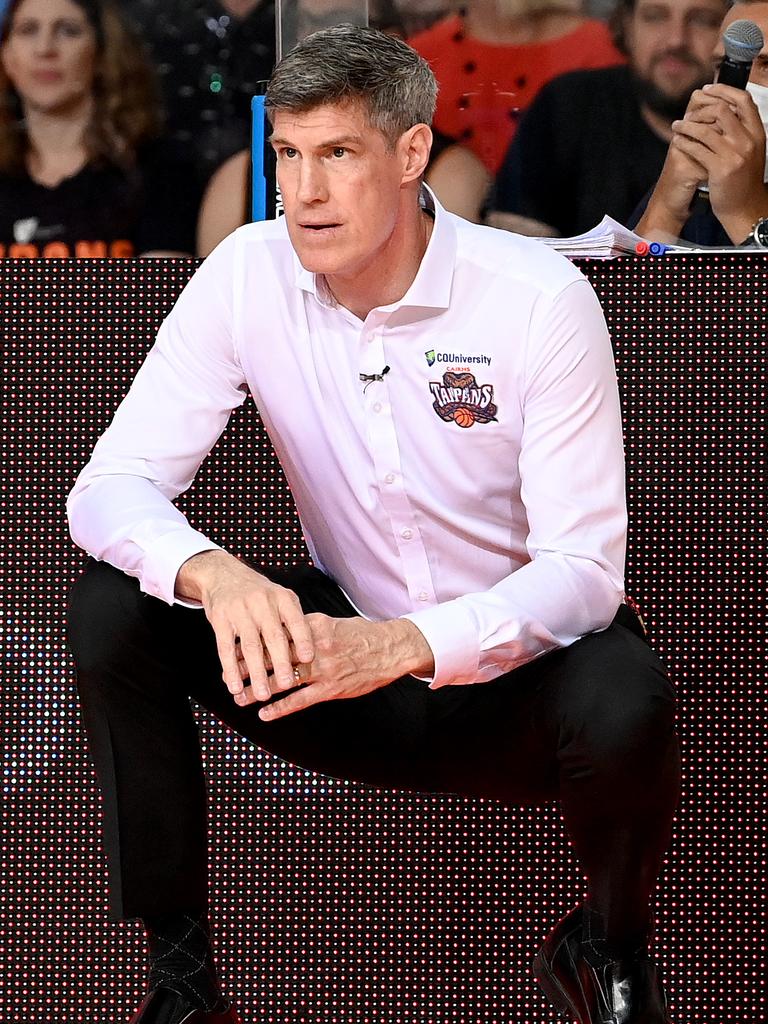 Mike Kelly watches on from the sidelines while coaching Cairns.