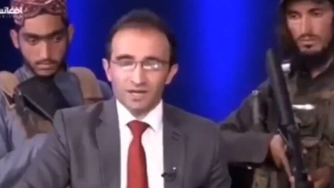 Taliban gunmen surround an Afghan TV host live on air. Picture: Twitter.