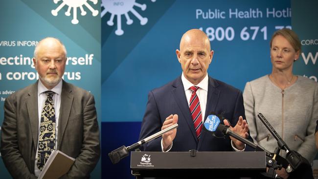 Tasmanian Premier Peter Gutwein, Director of Public Health Dr Mark Veitch and Health Minister Sarah Courtney during a press conference in Hobart. Picture: CHRIS KIDD