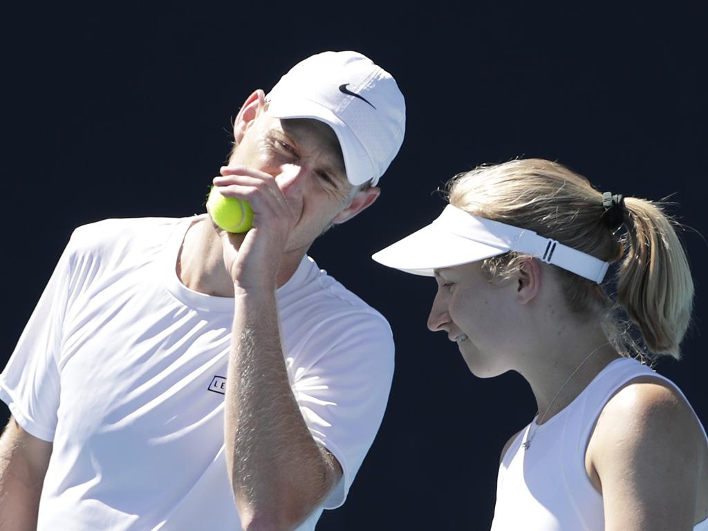 Pillow talk: Luke and Daria Saville talk tactics in their first round mixed doubles match at the 2022 Australian Open. Picture: Mackenzie Sweetnam/Getty Images