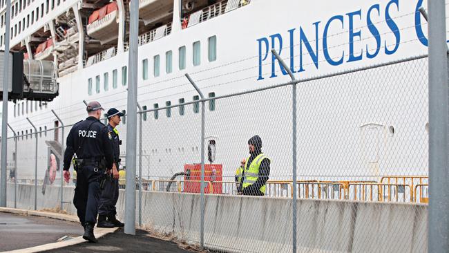 NSW police patrol the White Bay cruise terminal on Sydney Harbour at Rozelle on Thursday. Picture: Adam Yip