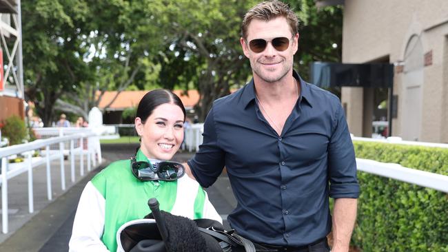 Superstar actor Chris Hemsworth congratulates young jockey Courtney Bellamy on her first Saturday winner at Eagle Farm. Picture: Supplied