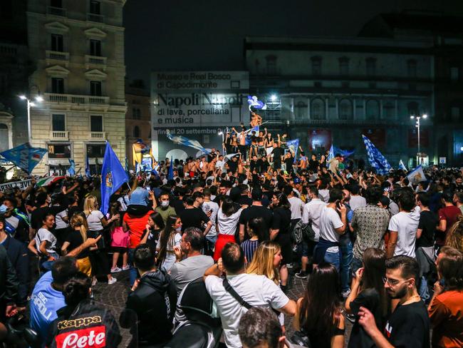 Napoli supporters celebrate in downtown Naples. Picture: AFP