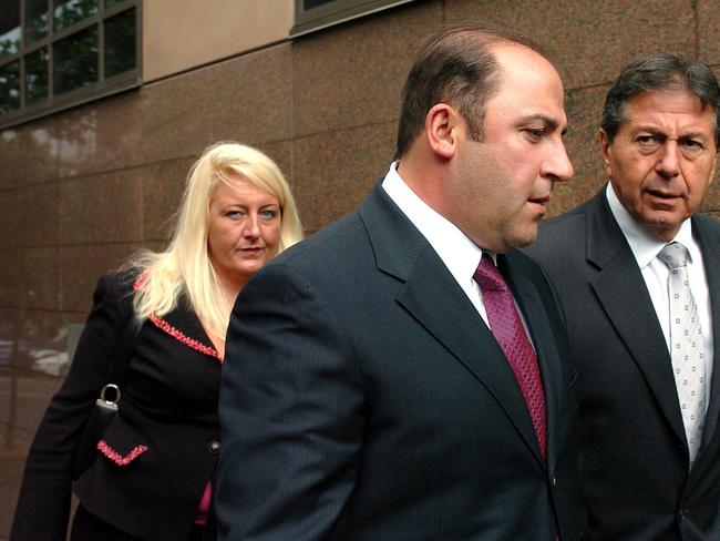 Tony Mokbel (centre) with his legal team Nicola Gobbo (left) and Con Heliotis QC (right) outside court.