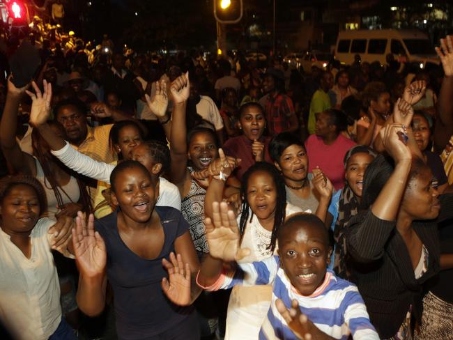 Zimbabweans celebrate in neighbouring Hillbrow, Johannesburg, South Africa, after Mugabe resigned as president after 37 years in power. Picture: Themba Hadebe/AP