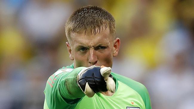 England goalkeeper Jordan Pickford orders his troops into position on the way to England’s 2-0 win. Picture: AP