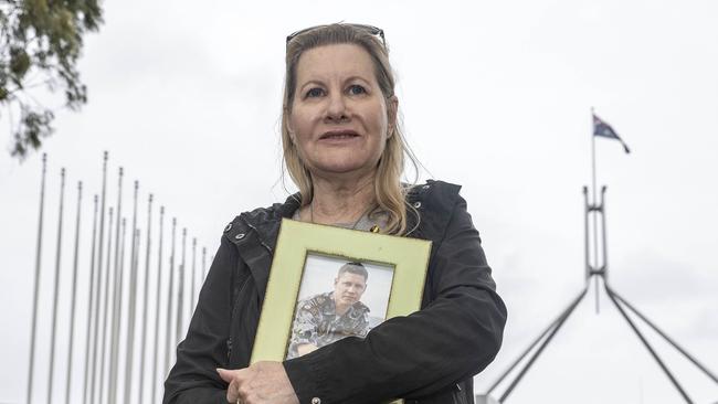 The mother of Dave Finney, Julie-Ann Finney. Australian veterans gather outside Parliament House in Canberra to petition for a royal commission into suicides among veterans and defence personnel. Picture: NCA NewsWire / Gary Ramage