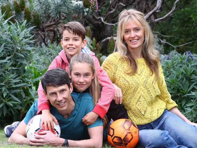 Barwon Heads dad Stephen Gill balances life as a Research Fellow with the Barwon Centre for Orthopaedic Research, a dad to two children, a sports coach and on the board of the local school.Pictured at home with his wife Annabel and children Siena 11yrs and Elliott 8yrs.  picture: Glenn Ferguson