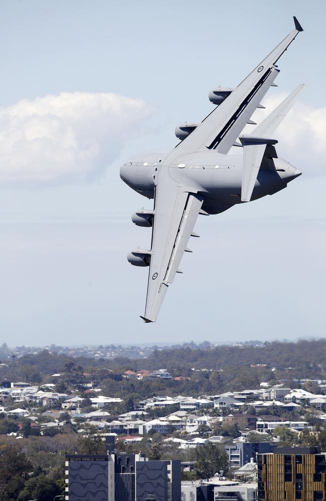 RAAF C-17 Globemaster pictured flying over Brisbane (from the Emporium Hotel) in preparation for its Riverfire Festival display this Saturday. Image/Josh Woning