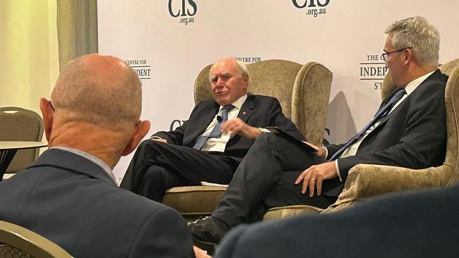 Former prime minister John Howard speaks with Tom Switzer at a CIS event in Melbourne.