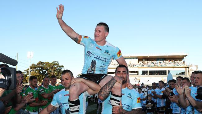 Paul Gallen is chaired off for the last time at Shark Park. Picture: Brett Costello