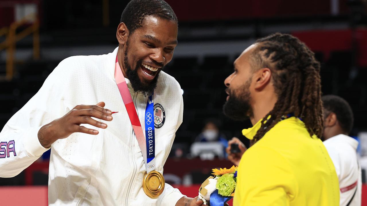 Kevin Durant and Patty Mills celebrate gold and bronze. . Pics Adam Head