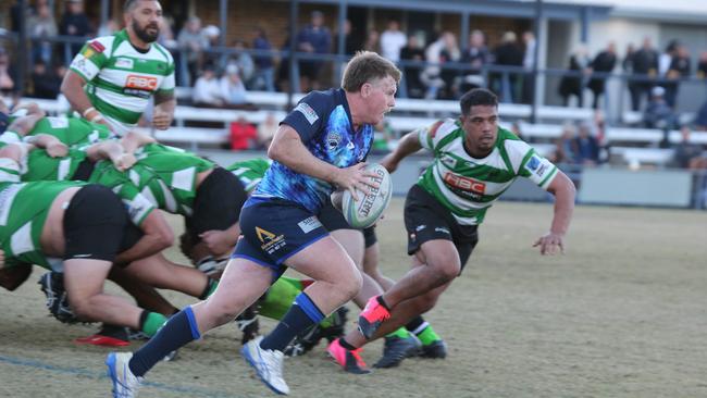 Gold Coast District Rugby Union (GCDRU) first grade clash between Helensvale Hogs (Blue) and Palm Beach Currumbin Alleygators (Green). Match Played at Helensvale. Scott Stokes. Pic Mike Batterham