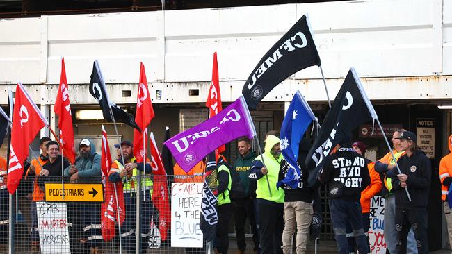 CFMEU members pictured blocking Cross River Rail workers from entering the Roma Street station worksite. Picture: David Clark.