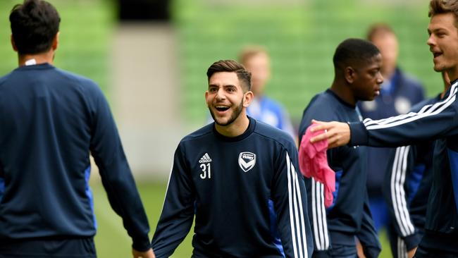 Winger Christian Theoharous (centre) was eagerly anticipating a rare Victory start. Pic AAP Images