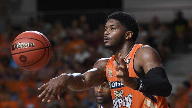 CAIRNS, AUSTRALIA – MARCH 28: Cameron Oliver of the Taipans passes the ball during the round 11 NBL match between the Cairns Taipans and the Adelaide 36ers at Cairns Pop Up Arena on March 28, 2021 in Cairns, Australia. (Photo by Albert Perez/Getty Images)