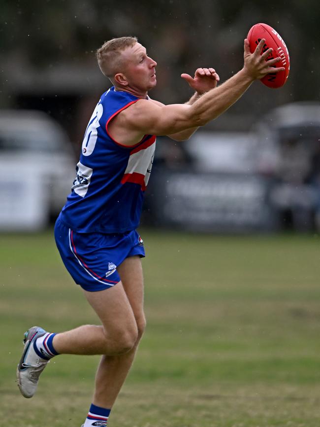 Nicholas Matthews aims to get the ball under control. Picture: Andy Brownbill