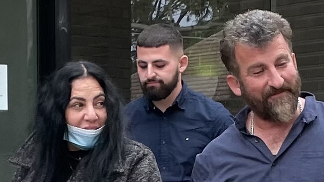 Ali Mustapha (middle) pictured with his parents outside Sutherland Local Court last year. Picture: Ashleigh Tullis