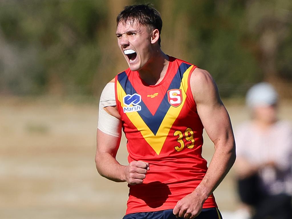 Noah Howes celebrates one of his goals for South Australia. Picture: Sarah Reed/AFL Photos via Getty Images