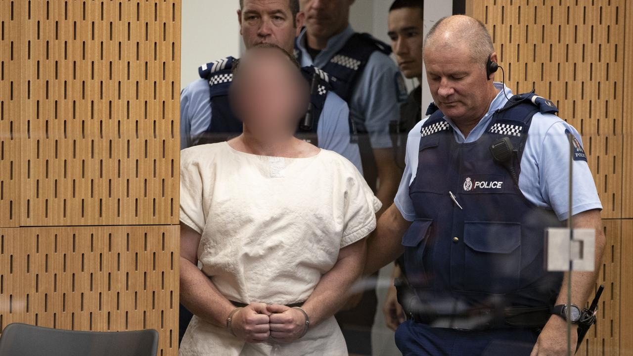 Brenton Tarrant being led into the dock for his appearance in the Christchurch District Court on March 16. Picture: Mark Mitchell/Getty Images) 