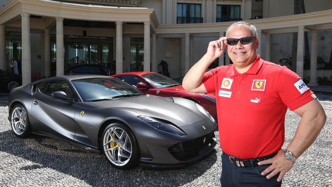 Mayor Tom Tate with a Ferrari at Palazzo Versace. Picture: Glenn Hampson.