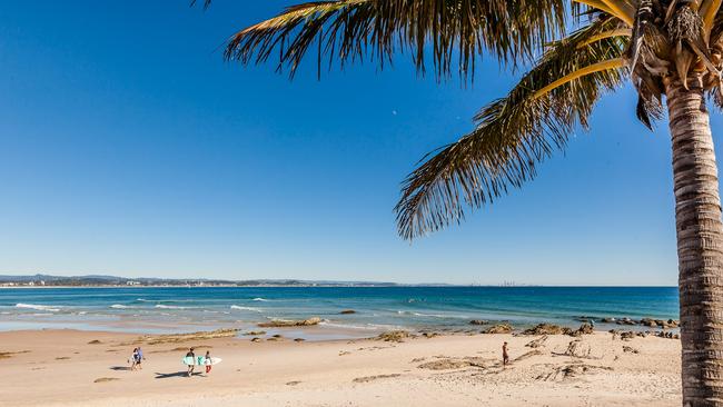 Surfers on the sand at Snapper Rocks. Picture: Destination Gold Coast