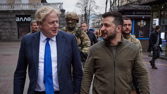 Boris Johnson walks in central Kyiv with Volodymyr Zelensky on Saturday. Picture: AFP