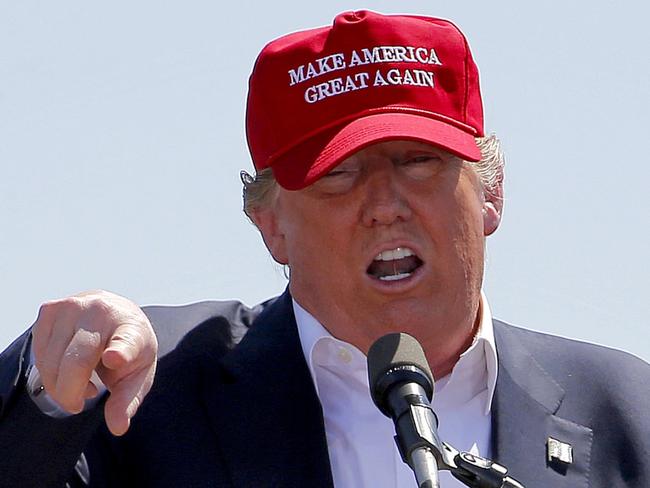 FILE - In this March 19, 2016 file photo, Republican presidential candidate Donald Trump speaks during a campaign rally Saturday, March 19, 2016, in Fountain Hills, Ariz. Donald Trump promises to “Make America Great Again.” George Wallace said he would “Stand up for America.” The 2016 Republican presidential front-runner doesn’t say he’s following the 1960s playbook of the Alabama segregationist, a four-time presidential hopeful.(AP Photo/Matt York, File)