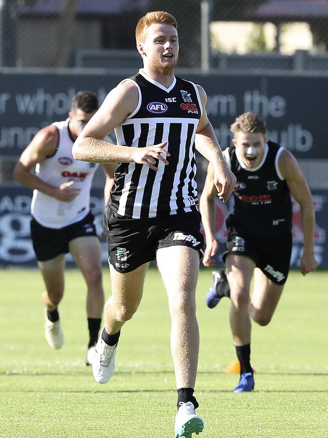 Round 1 hopeful Willem Drew charges through training at Alberton Oval. Picture SARAH REED