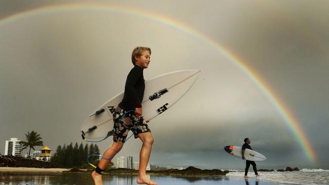 Young surfer Noah Lee, 12, at his home break Snapper Rocks — the Gold Coast never has a problem selling its beaches. Picture: Luke Marsden.