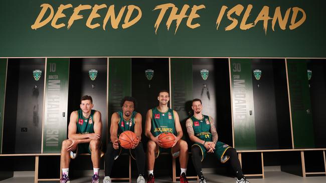 Last season’s JackJumpers teammates Will Magnay, MiKyle McIntosh, Jack McVeigh and Josh Adams in the players’ change room at MyState Bank Arena. Picture: Nikki Davis-Jones