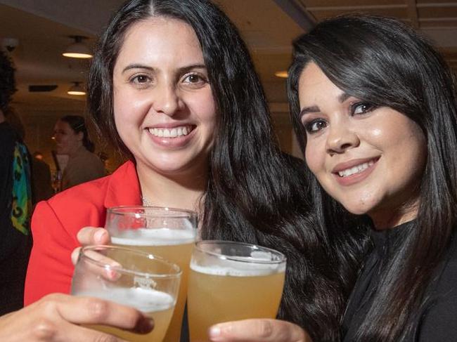 Dani Barona (left), Angela Osorio (centre) and Kate Alfonso enjoy catch-up drinks at The Clock in Surry Hills. Picture: Julian Andrews