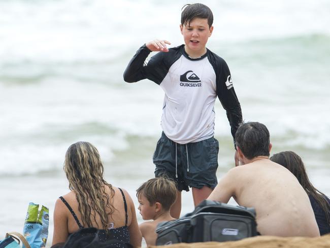 Prince Christian,12, was seen sporting a Quiksilver rashie. Princess Mary and her royal family hit Sydney’s Palm Beach for a dip before they head to Tasmania for an Aussie Christmas. Picture: Media Mode