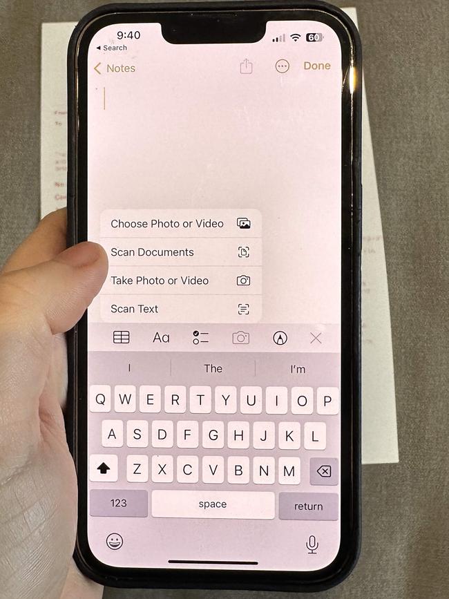 Next, tap the Camera button and choose Scan Documents. Picture: Elly Awesome