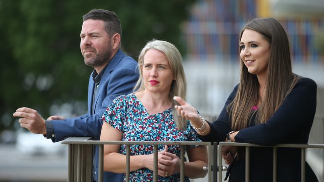 Dan Barr from TEG Dainty, Minister Kates Jones and local MP Meghan Scanlon announced the move to Metricon Stadium. Picture Glenn Hampson