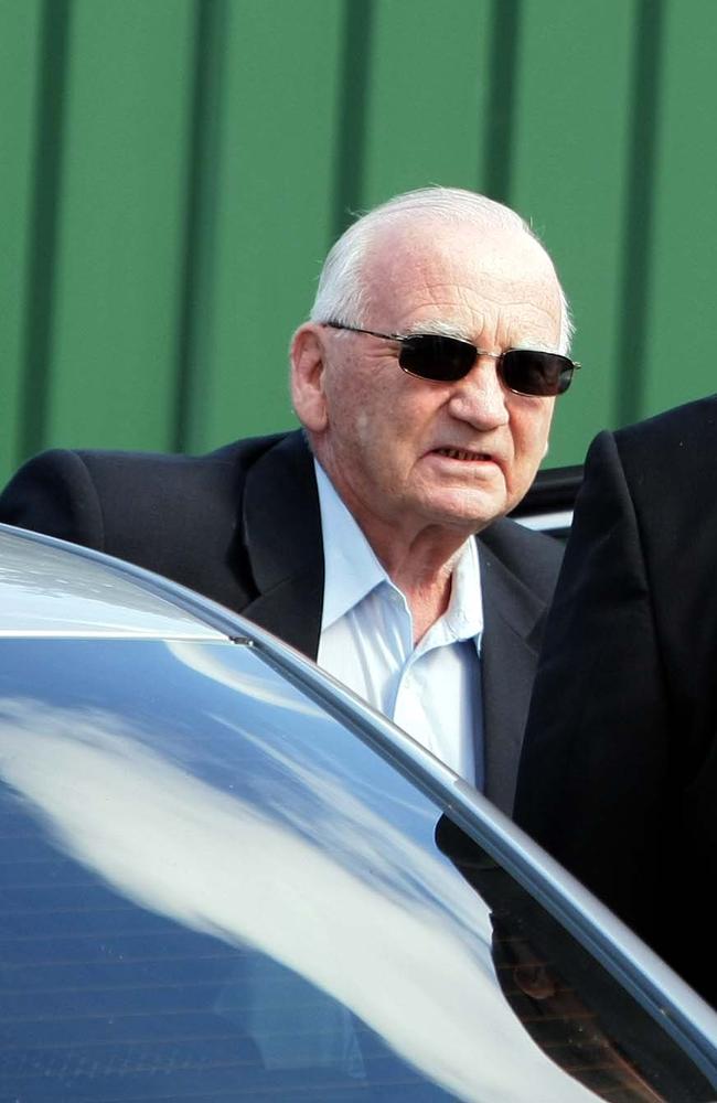 Convicted paedophile priest Finian Egan arrives at Ryde Police station in Sydney.