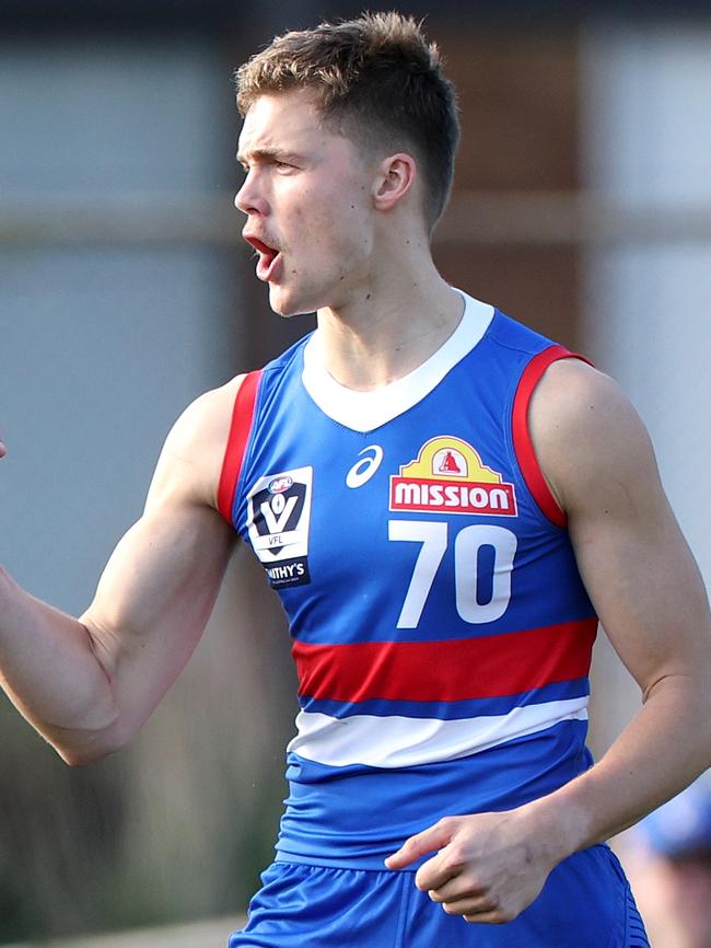 Caleb Lewis celebrates a goal for Footscray in the VFL.