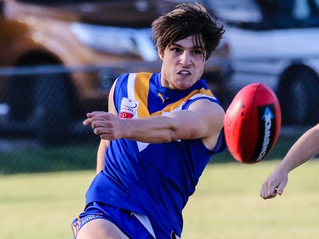 Bailey Stevens gets a kick away for Heathmont against Waverley Blues in the Eastern Football League (EFL). Picture: Chris Mirtschin