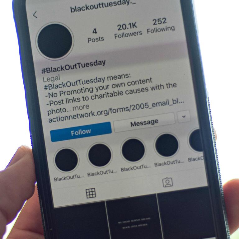 A smartphone displaying the Instagram #blackouttuesday account. Picture: Eric Baradat/AFP