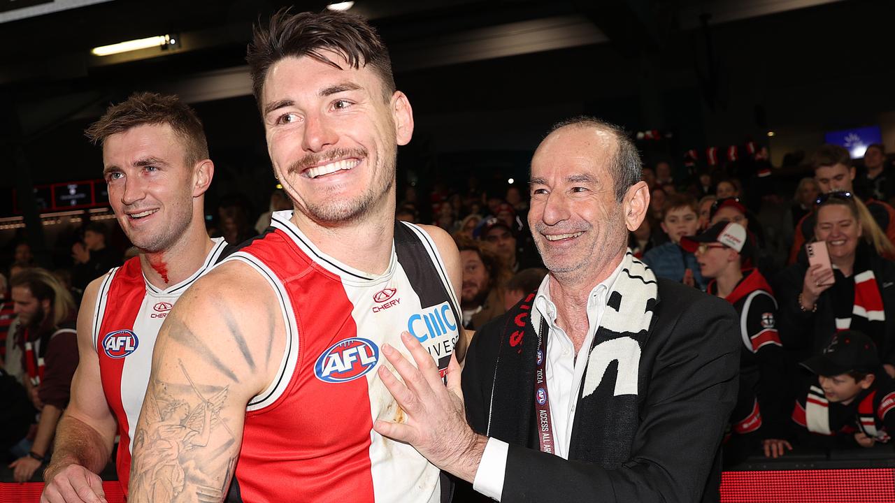 MELBOURNE, AUSTRALIA - JULY 07: Andrew Bassat, President of St Kilda Football Club celebrates with Josh Battle of the Saints during the round 17 AFL match between St Kilda Saints and Sydney Swans at Marvel Stadium, on July 07, 2024, in Melbourne, Australia. (Photo by Kelly Defina/Getty Images)