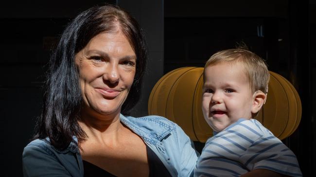 Lucy Barras with her 17-month-old son Henry Barras, who was diagnosed with hearing loss through a newborn screening and now thrives with his cochlear implant. Picture: Pema Tamang Pakhrin