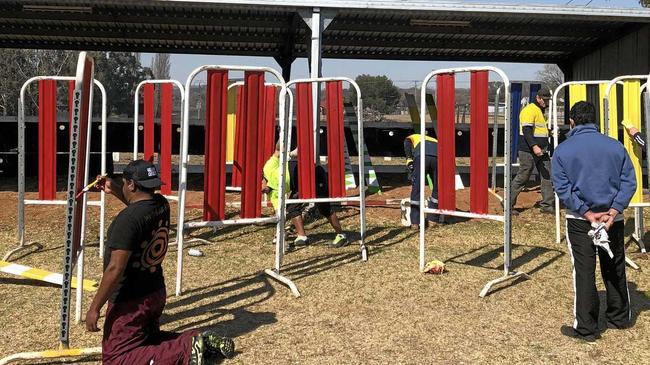 Residents of the Balund-a diversionary program helped the Tenterfield Show Society to give facilities a new lick of paint during the time they were displaced from the program's Tabulam property due to a bushfire. Picture: Corrective Services NSW