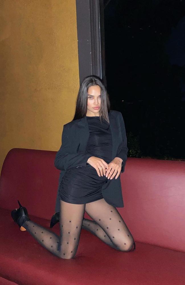 The Australian model teamed the tights with a black mini dress, heels and a blazer. Picture: Instagram