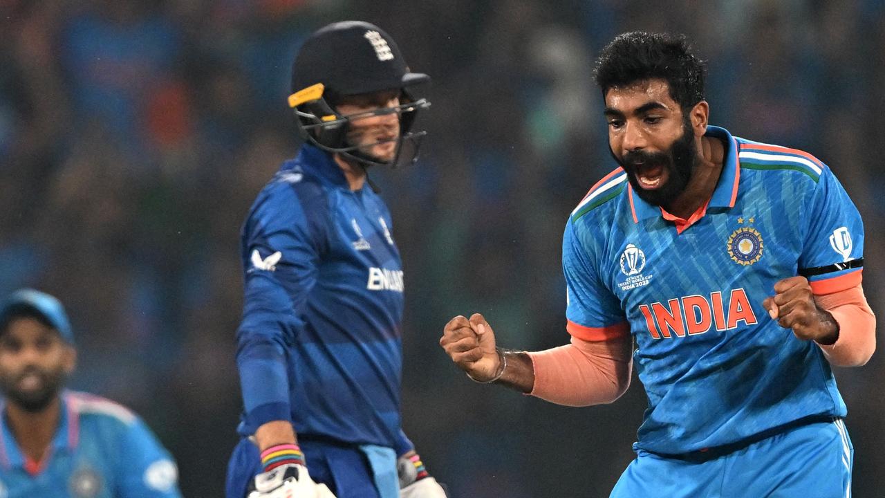 Jasprit Bumrah (R) celebrating the wicket of Joe Root. Picture: Sajjad HUSSAIN / AFP