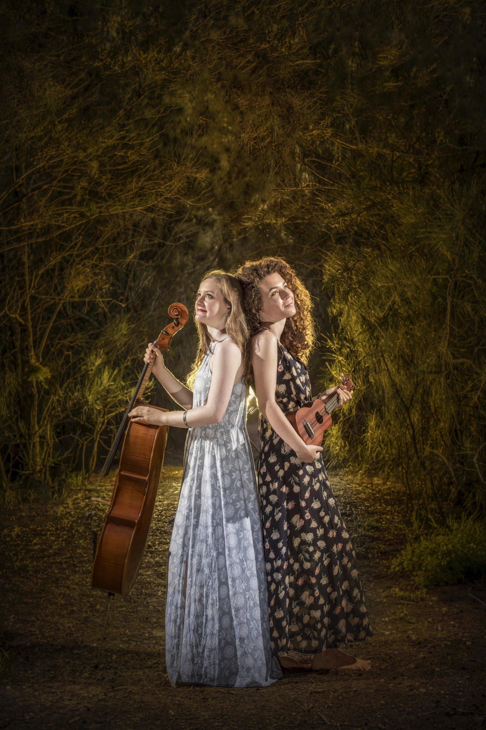 Breanna Ryan and Grace Hickey - who make up duo \"Solstice\" - combining their talents to play some entertainment at the Relay For Life.Photo Adam Hourigan / The Daily Examiner. Picture: Adam Hourigan