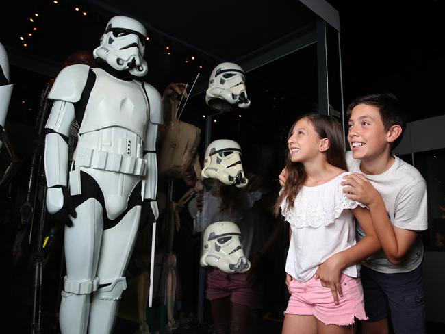 Chiara Cencigh, 11, and her brother Alessio, 12 pose at the Star Wars exhibit at the Powerhouse Museum for the Sunday Telegraph school holiday fun guide. Picture: David Swift.