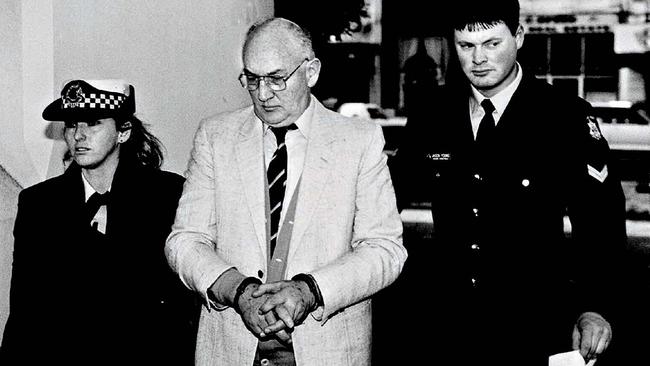 Catholic priest Gerald Francis Ridsdale is led into a Melbourne court in 1994.