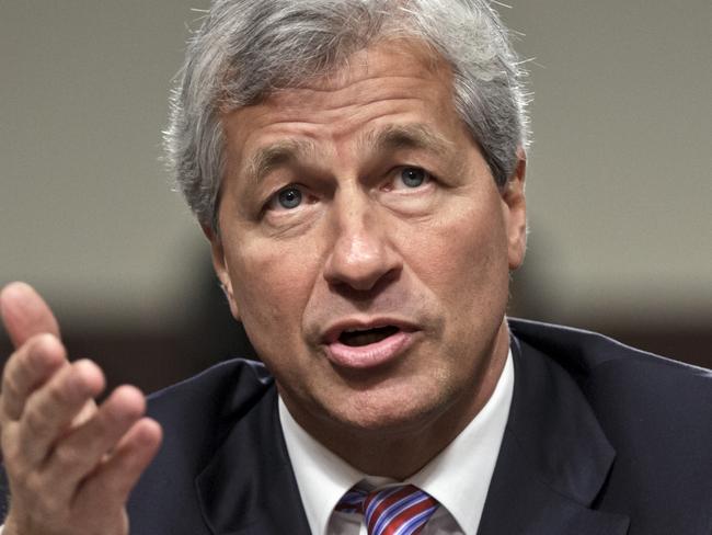 Still has job ... JP Morgan Chase CEO Jamie Dimon testifies before the Senate Banking Committee. He remains the head of JP Morgan. Picture: AP Photo/J. Scott Applewhite.