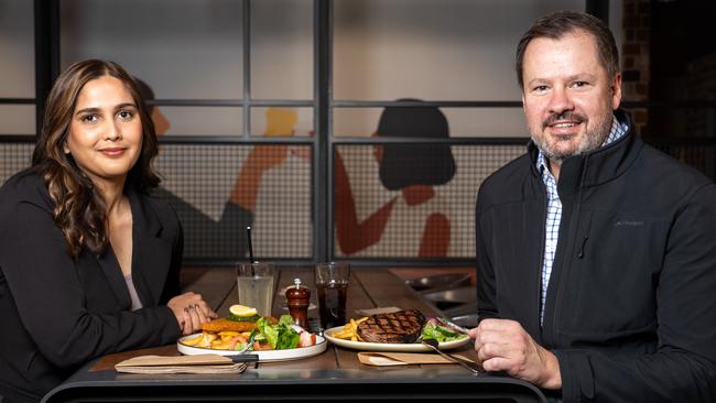 Reporter Angira Bharadwaj with Mr Husic at the Marsden Brewhouse. Picture: Tom Parrish