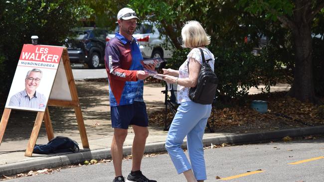 Mundingburra candidates Les Walker, Janelle Poole and Michael Pugh meet with early voters on October 14. Photo: Daniel Shirkie.